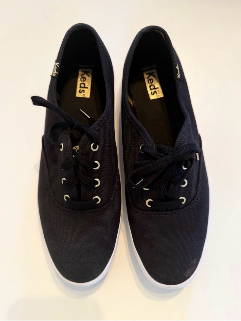 Keds Champion Canvas Sneakers in Black with White Sole and Gold Accents